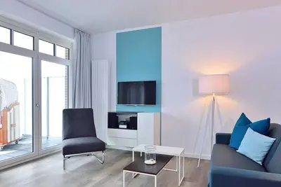 Image de Great vacation apartment on the North Sea with sea view, west-facing balcony and beach chair!
