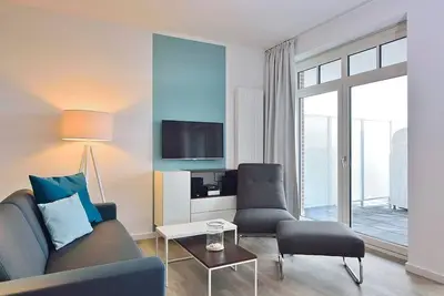 Image de Modern vacation apartment on the North Sea with sea view, balcony and beach chair! -