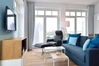 Image de Modern apartment by the sea with west-facing balcony, sea view and sauna area in the house! -