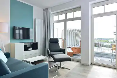 Image de Chic apartment by the sea with west-facing balcony, sea view and private beach chair!
