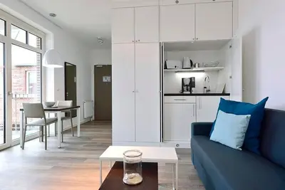 Image de First-class apartment by the sea with sunny south-facing balcony - sauna in the house!