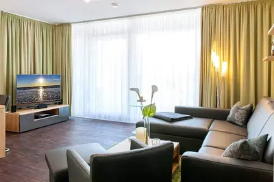Image de High-quality family apartment with large balcony, whirlpool bath and wood-burning stove -