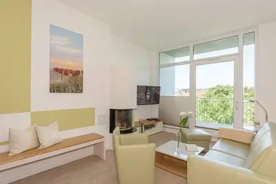 Image de Great vacation apartment with roof terrace, beach chair, fireplace, sauna and sea view