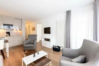 Image de Apartment with south-facing balcony incl. free use of swimming pool & sauna near the beach -