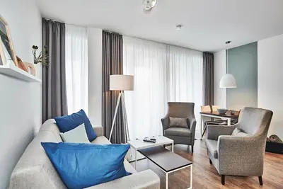 Image de Vacation apartment close to the beach with large terrace incl. use of swimming pool & sauna