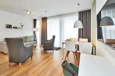 Image de Vacation apartment close to the beach with large balcony incl. use of swimming pool & sauna -