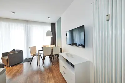 Image de Vacation apartment close to the beach with large balcony incl. use of swimming pool & sauna -