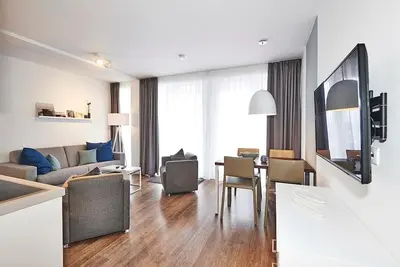 Image de Vacation apartment close to the beach with large balcony incl. use of swimming pool & sauna -