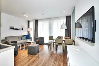 Image de Apartment near the North Sea with large terrace incl. use of swimming pool & sauna -