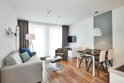 Image de Apartment near the North Sea with two balconies incl. use of swimming pool & sauna -