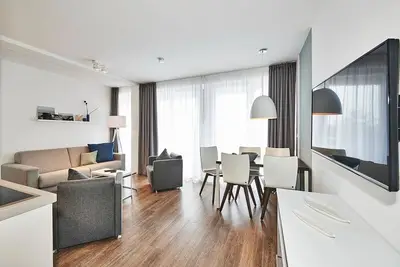 Image de Apartment near the North Sea with large balcony incl. use of swimming pool & sauna -