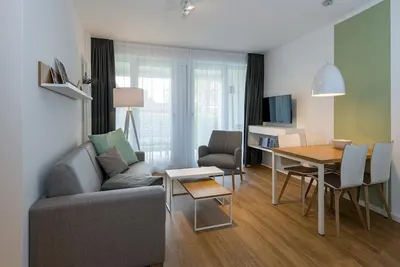 Image de Beachfront apartment with terraces incl. parking, use of swimming pool & sauna