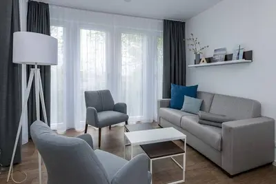 Image de Beachfront apartment with large balcony, parking, use of swimming pool & sauna -