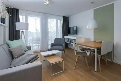 Image de Vacation apartment, close to the beach, with balconies, parking, use of swimming pool & sauna