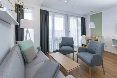 Image de Apartment, close to the beach, with large balcony, parking, use of swimming pool & sauna!