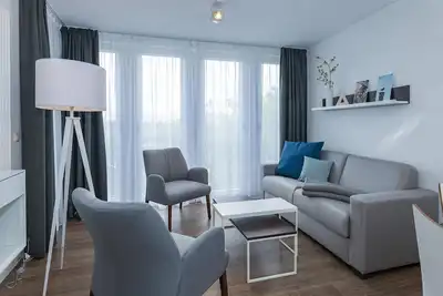 Image de Vacation apartment, close to the beach, with balcony, parking, use of swimming pool & sauna -