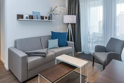 Image de Vacation apartment close to the beach with balconies, parking, use of swimming pool & sauna