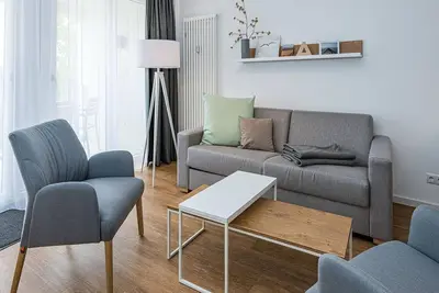 Image de Family apartment near the beach with balcony, parking, use of swimming pool & sauna