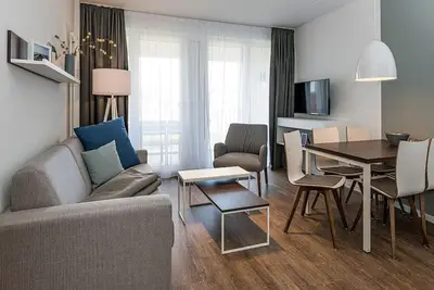 Image de Vacation apartment close to the beach with balconies, parking, use of swimming pool & sauna