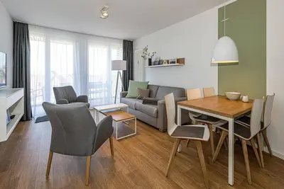 Image de Vacation apartment near the North Sea with balcony, parking, use of swimming pool & sauna -