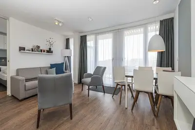 Image de Beachfront apartment with large balcony, parking, use of swimming pool & sauna -