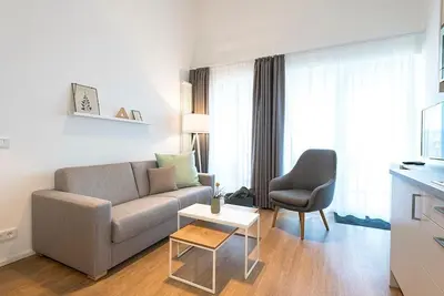 Image de Top apartment near the beach with sheltered loggia and sauna area in the house! -