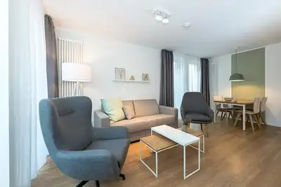 Image de Great apartment in top location with sunny south-facing terrace and sauna area in the house -