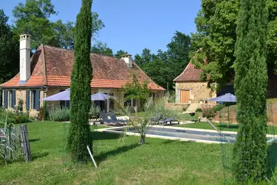 Image de Tremolat: Renovated Perigord farmhouse with heated pool and air conditioning.
