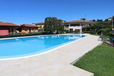 Image de Maison près du Lac de Garde avec Piscine