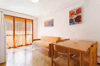 Image de Appartement \"Condominio Simma 1b6\" avec A/C & Terrasse