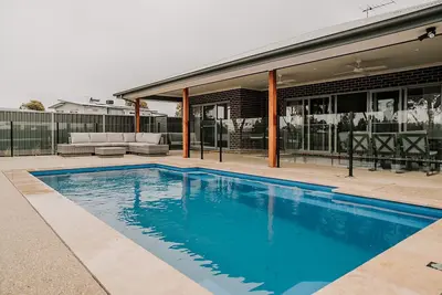Image de A Brand New Home with a Pool overlooking The Black Bull Golf Course