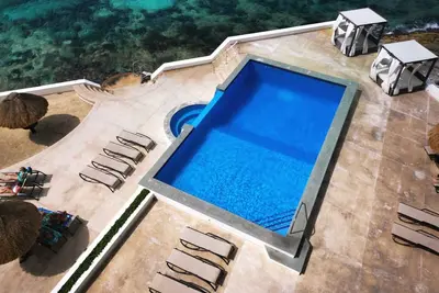 Image de Beautiful 3 Bedrooms Ocean Front Condominium 🥂 With the Best Sunsets View.