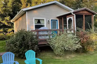 Image de A Cozy, New, Tucked Away Cottage