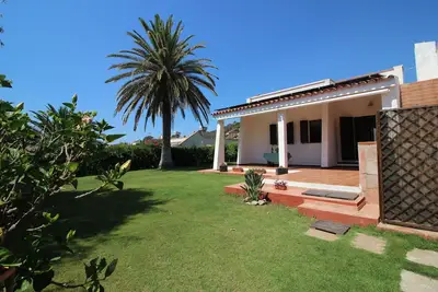 Image de Villa with private garden 50 meters from the beach in the center of Costa Rei