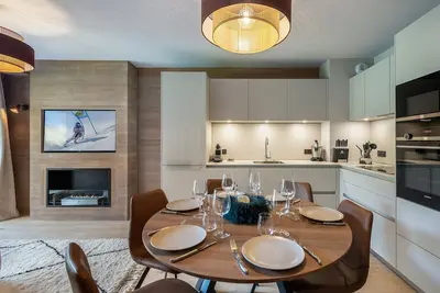 Image de Appartement à Megève avec espace bien-être, piscine, sauna et salle de sport