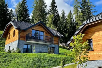 Image de Tomtegl-Bergchalet No. 8 mit Privatsauna, Infinitypool, Kamin, Fitnessraum, 1500m Seehöhe