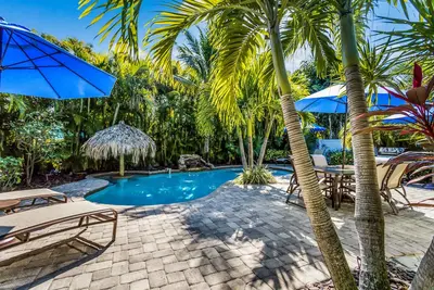 Image de Vibrant Island Retreat with Pool, Tiki Table and Walk to Beach
