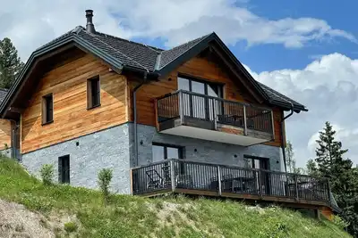 Image de Tomtegl-Bergchalet No. 10 mit Privatsauna, Infinitypool, Kamin, Fitnessraum, 1500m Seehöhe