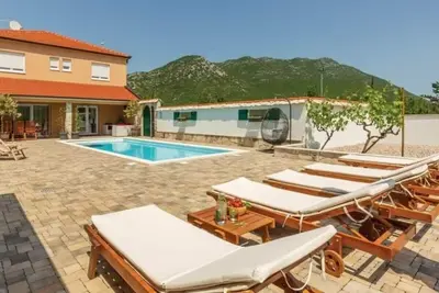 Image de Maison de vacances Dragljane pour 1 - 8 personnes avec 4 chambres Ă coucher - Maison de vacances