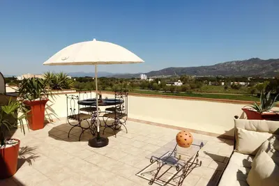 Image de Appartement de vacances à 5 min de la plage avec belle terrasse et vues dégajées sur le parc naturel.