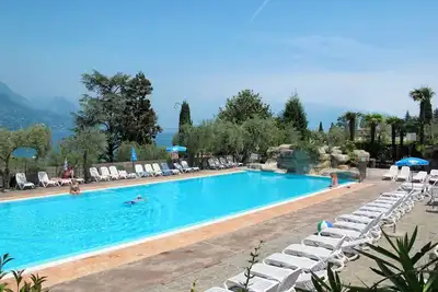 Image de Agréable appartement dans une maison de vacances avec climatisation, piscine, Wifi et terrasse
