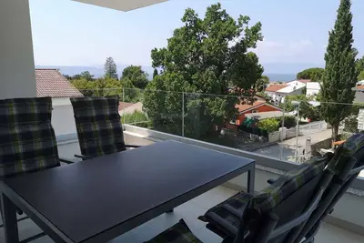 Image de Appartement de vacances avec balcon et vue sur la mer