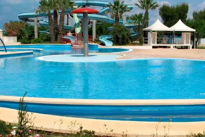 Image de Appartement dans une maison de vacances avec piscine, Wifi, climatisation, terrasse, parking