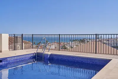 Image de Appartement 'Luxury Carabeo 2000 2-3' avec vue sur mer, piscine, terrasse et Wi-Fi