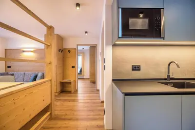 Image de \"Apartments Armeri Blue Dolomites\" avec vue sur les montagnes, balcon et Wi-Fi