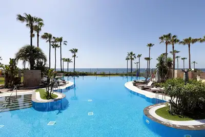 Image de Penthouse exclusif avec piscine, terrasse et Wi-Fi. Animaux bienvenus.