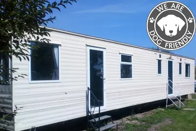 Image de Multiple dogs welcome Free - Static Caravan in private grounds next to the beach