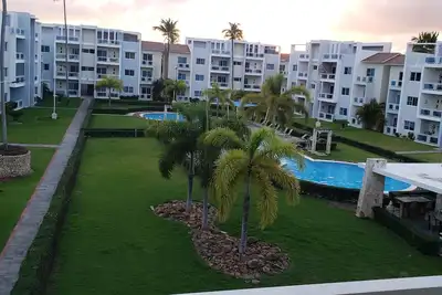 Image de Fully gated community, 24/7 security, 6 minutes walking distance to the beach.