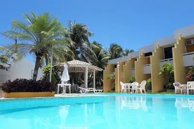 Image de Guarajuba, Duplex right on the sand. Great location!