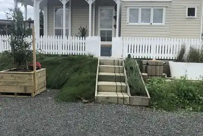 Image de Beautiful Tiny House with communal water hole.